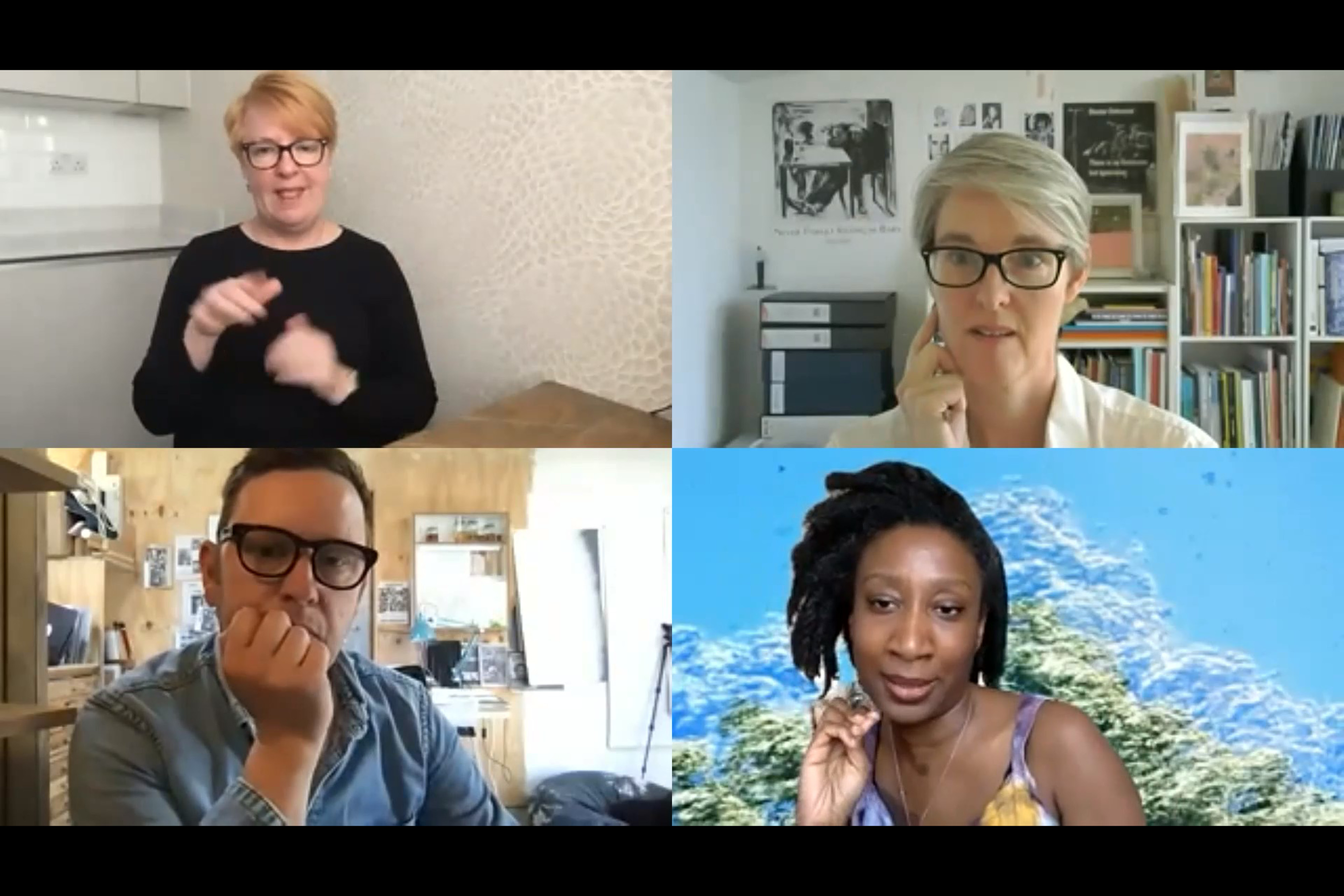 Four people on a zoom call.