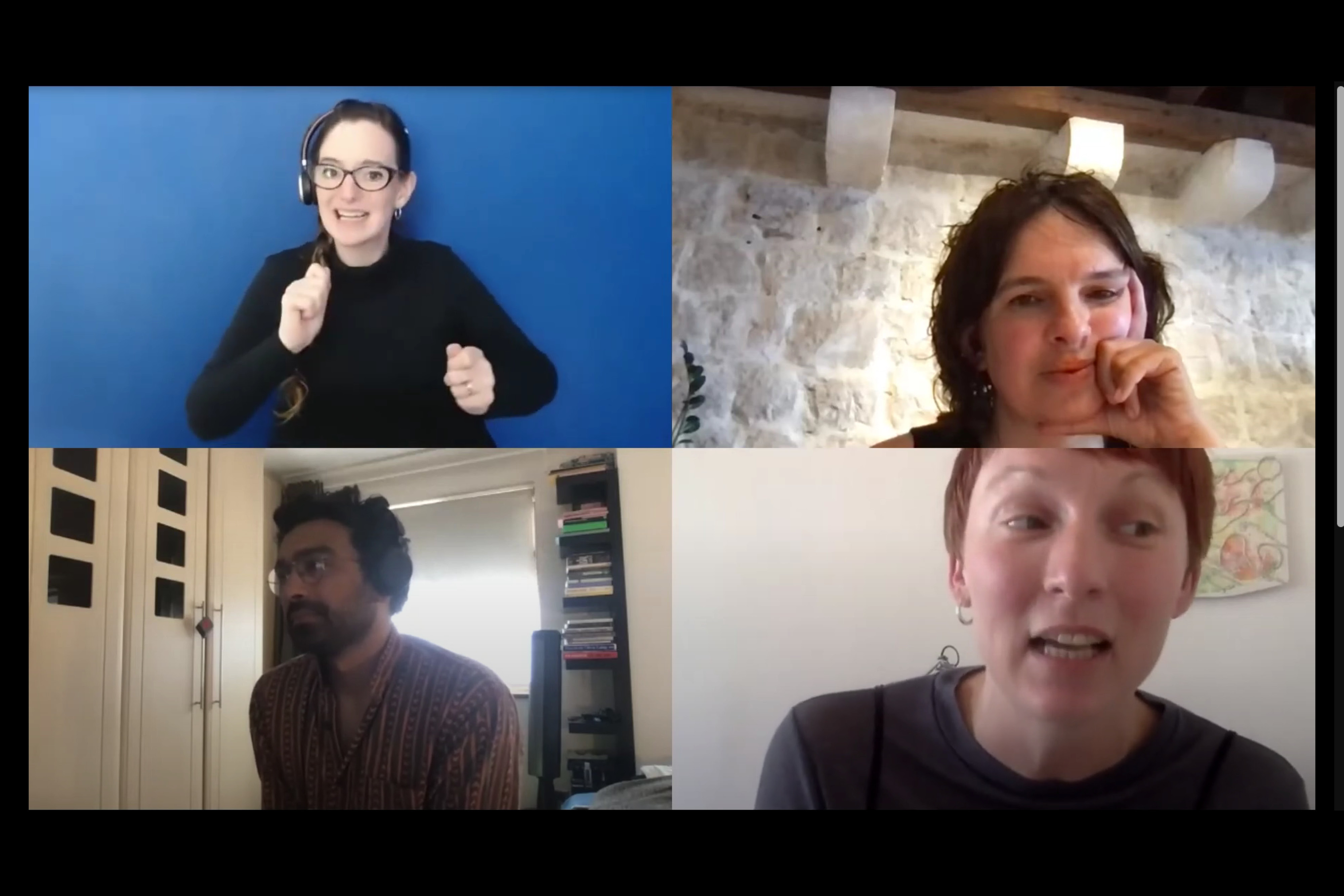 Four people on a zoom call.