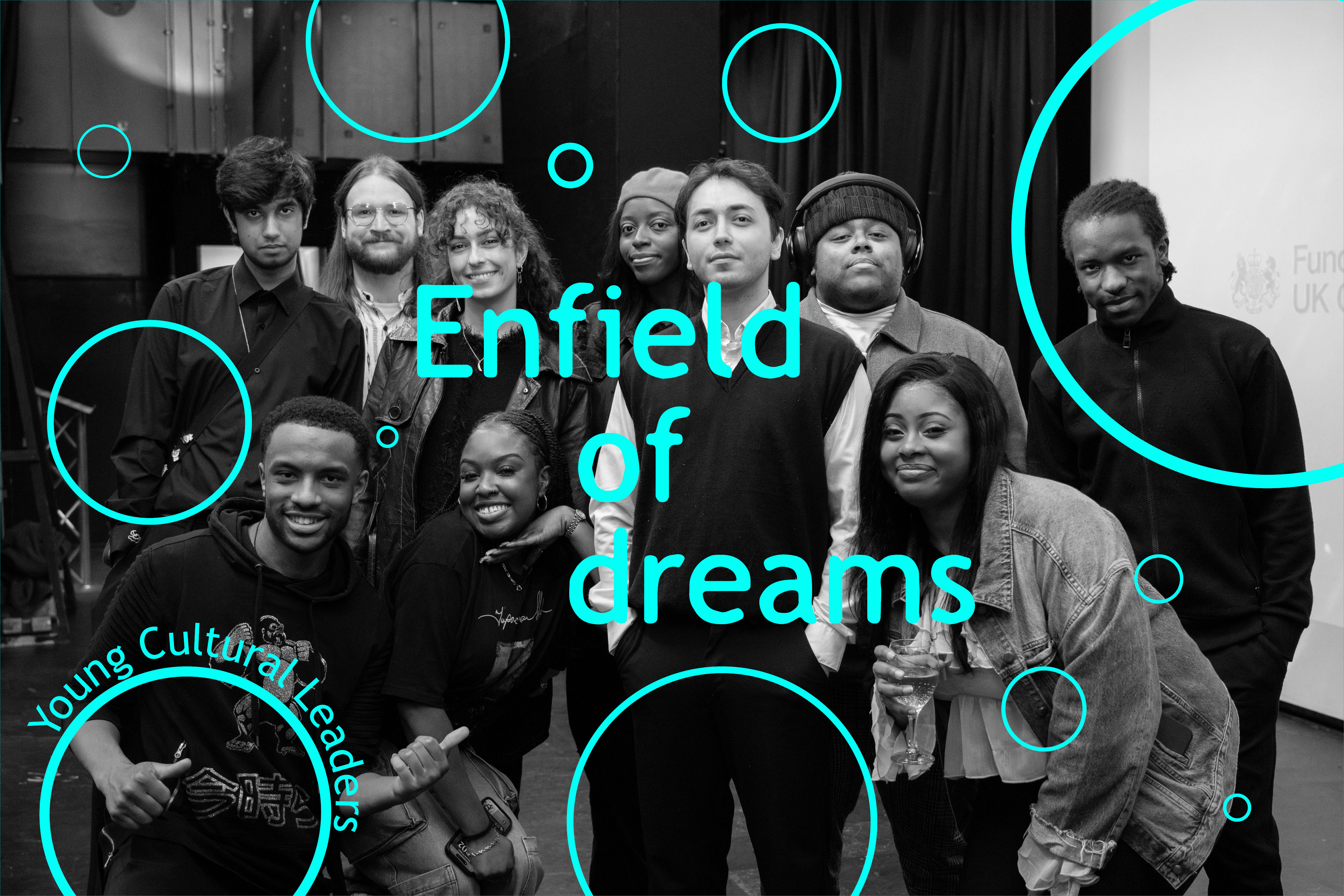 A group of young creatives posing together for a picture. Overlaid image with the words "Enfield of Dreams. Young Cultural Leaders" with neon blue bubbles.