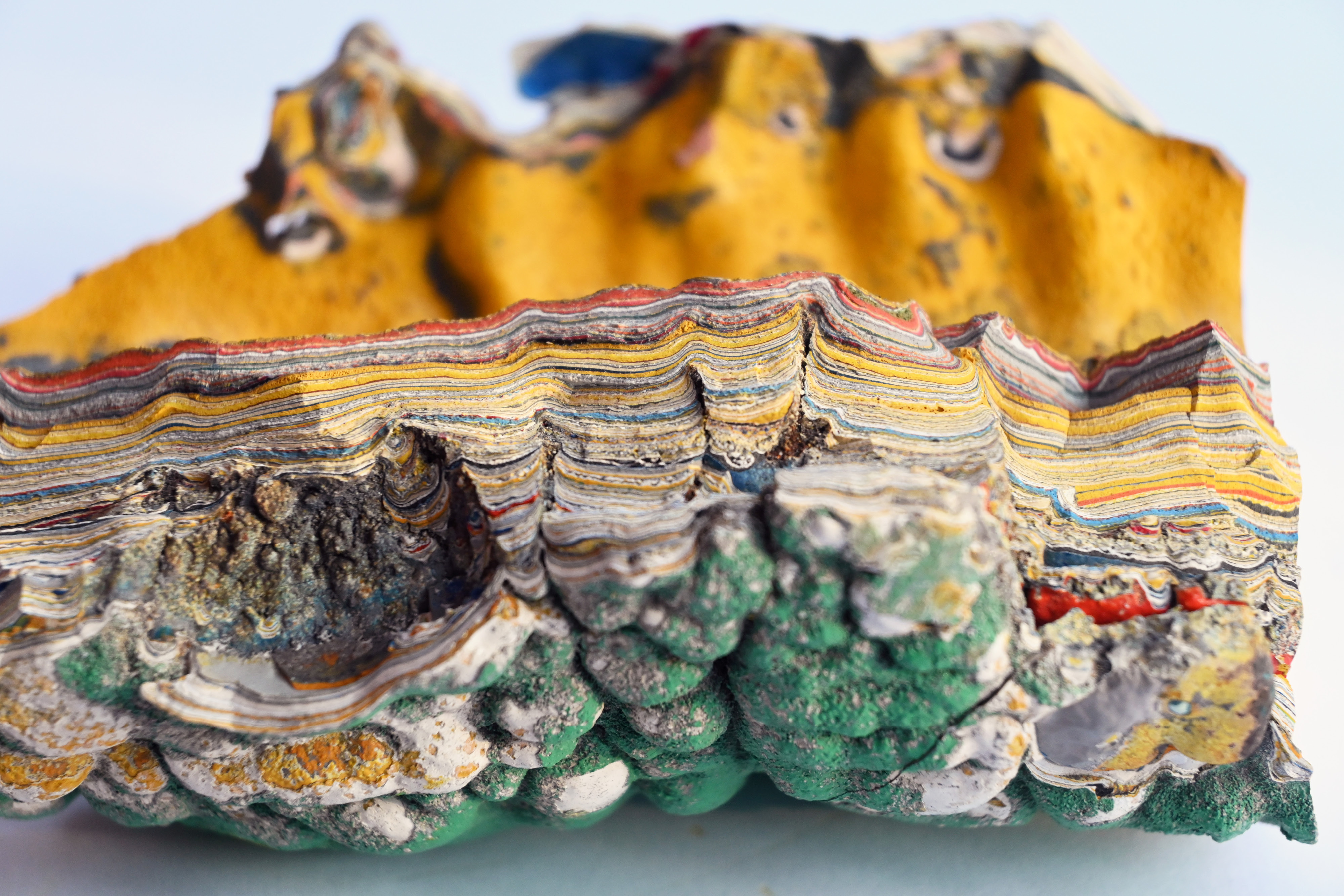 Large material made up of many layers of paint in different colours.